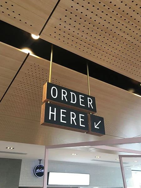 Where noise builds up in a restaurant — hard reflective surfaces bouncing sound around the dining room, by Acoustic Panels Australia