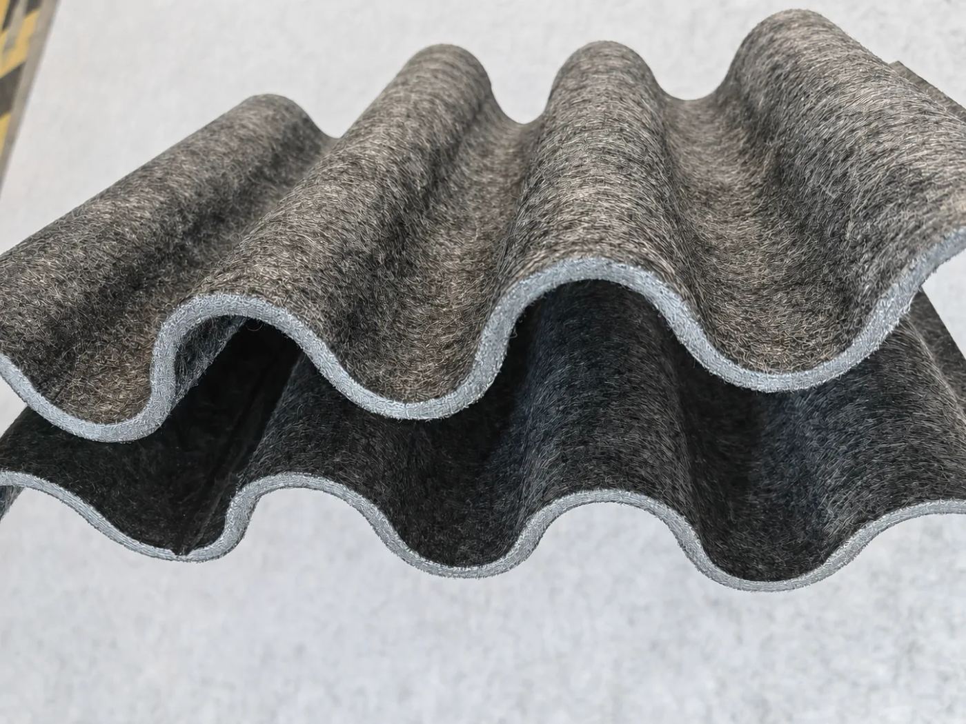Wave-profile acoustic panel material sample from Acoustic Panels Australia